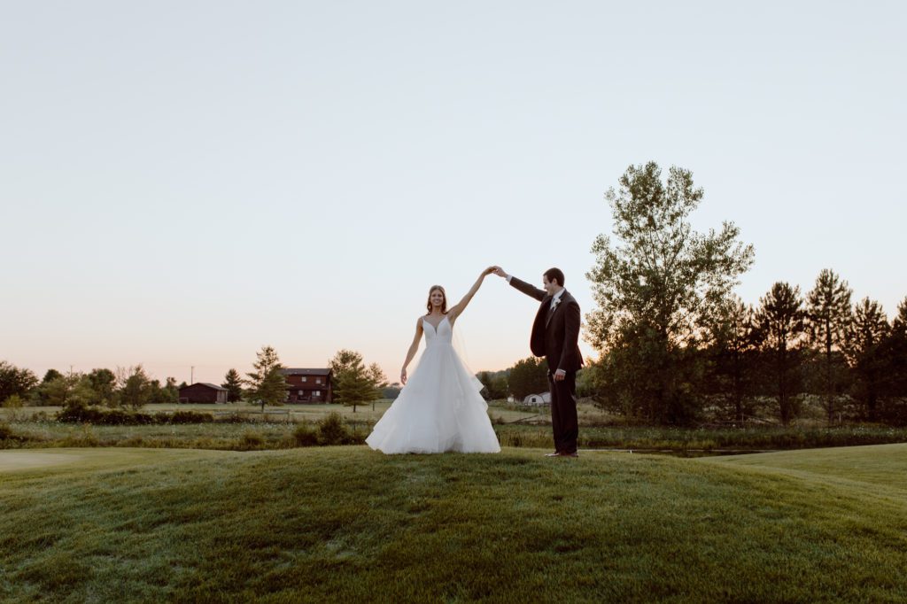 Sunset photos on the golf course at the wedding venue in Toledo, Stone Ridge