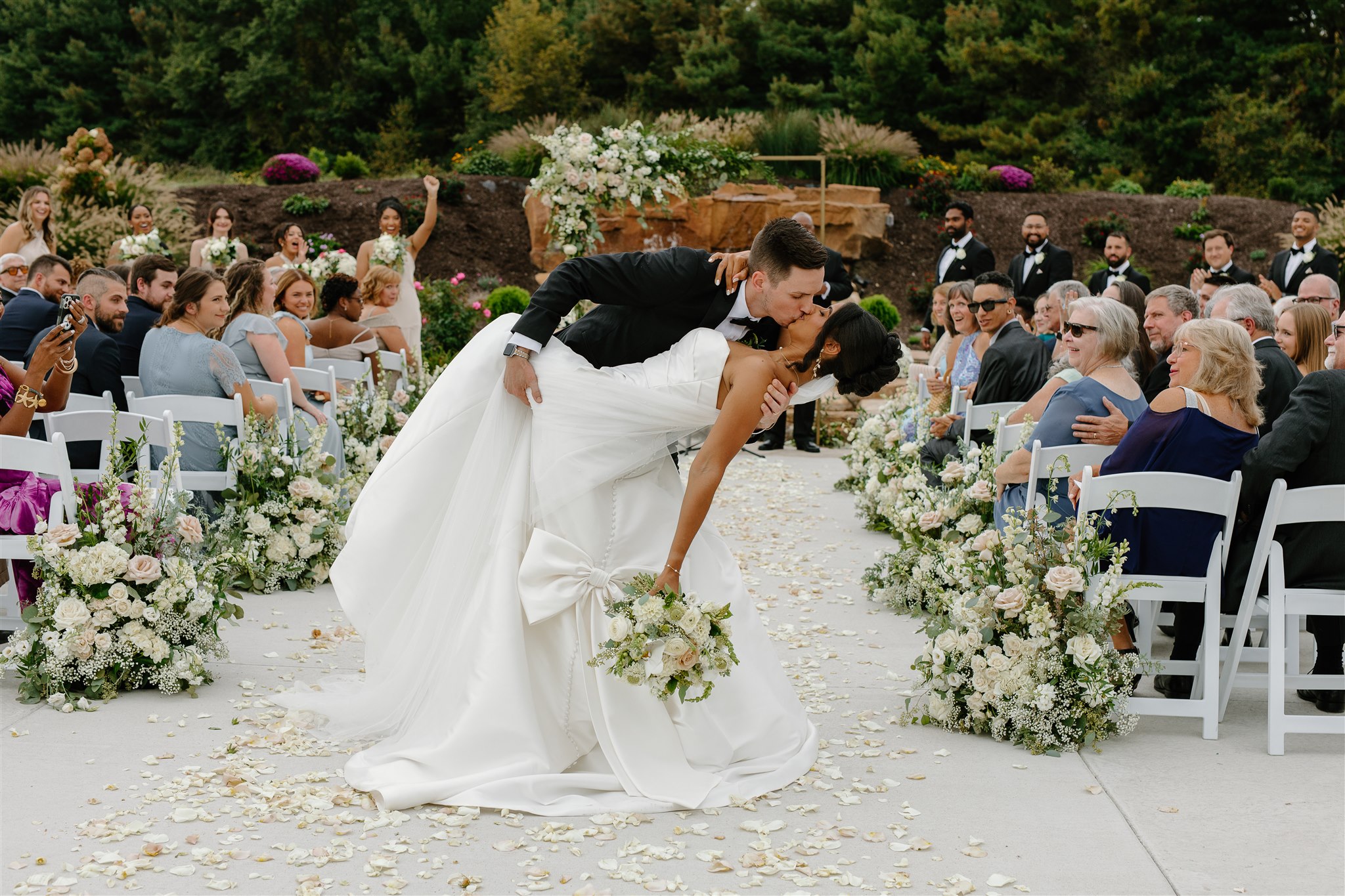 Birchwood Meadow wedding ceremony exit dip kiss