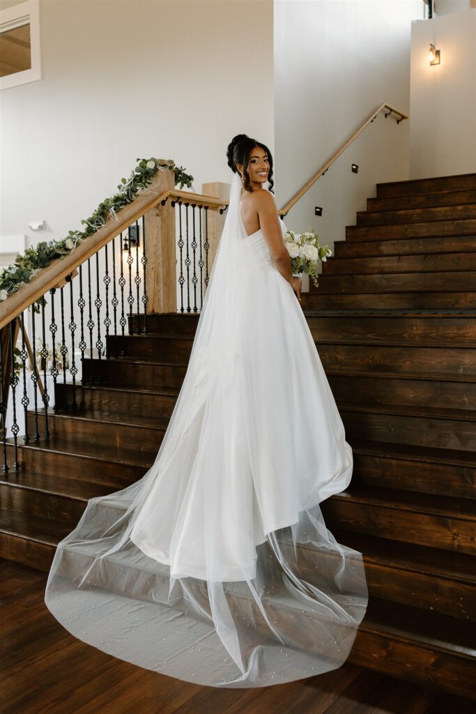 Grand staircase bridal portrait at Birchwood Meadow